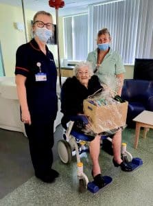 Olive delivering hand knitted items to the neo natal ward at Wythenshawe Hospital