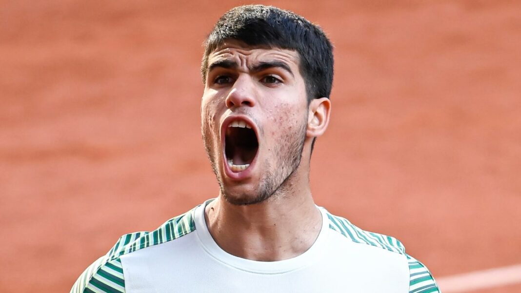 Carlos Alcaraz playing tennis